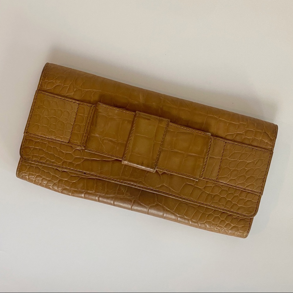 MICHAEL KORS Bow Accented Embossed Leather Clutch